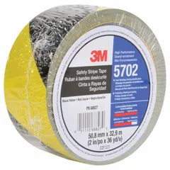This vinyl floor marking tape features a black/yellow striped pattern with no legend. It is 2 inches wide by 108 feet long and has a thickness of 5.4 mil. Commonly used for aisle marking, hazard identification, and general safety delineation in industrial and commercial facilities.