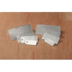 These blank valve tags are made from aluminum laminated material with a silver finish, each measuring 0.02 inches thick. The rectangular tags come in a pack of 25 and are designed for custom marking in industrial piping systems, plant maintenance, HVAC, and process control applications.