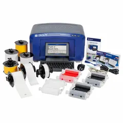 Multi-color desktop printer for safety and facility identification labels. Supports mobile device, PC, and standalone operation. Includes white ribbon cartridge, USB cable, battery, and Brady Workstation Safety and Facility Identification Software Suite.