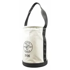 This canvas bucket bag from KLEIN TOOLS measures 14 inches in height and comes in off-white. It features one pocket and an open top design, constructed from canvas material. Suitable for carrying tools and equipment on job sites, it provides quick access to frequently used items.