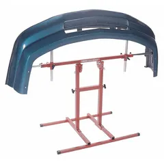 Steel work stand designed for holding bumpers during auto body repair and maintenance. Non-foldable construction with a maximum operating height of 63 inches and an operating width of 40 inches. Provides a stable workstation for bumper servicing.