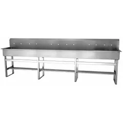 This six-station freestanding wash station is constructed from 16-gauge stainless steel. It features a 117-inch bowl length, 8-inch bowl depth, and 12 faucet holes. Side splash is not included. Faucets are sold separately. Suitable for high-capacity handwashing in industrial environments.