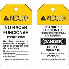 This caution tag is made of heavy duty polyester with a write-on surface for custom messages. It displays the word 'Precaucion' and includes both English and Spanish text. Suitable for use in industrial environments to communicate safety warnings.