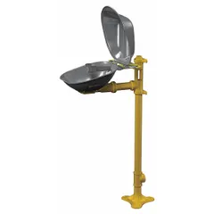 Floor-mount eyewash station with covered stainless steel bowl and push-plate activation. Provides eyes-only coverage for emergency irrigation. Suitable for industrial environments where plumbed eyewash is required.