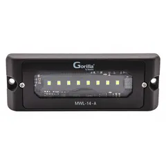 This MAXXIMA LED floodlight is designed for permanent surface-mount installation on vehicles. It features a black rectangular housing, a bracket for mounting, and wire leads for universal electrical connection. The flood beam pattern provides area illumination for tasks such as loading, repair, or equipment inspection.