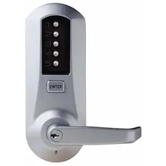 Mechanical push button lockset in chrome finish. Provides keyless entry with a KABA Cylinder (KABA 90 Keyway) for key override. Suitable for interior doors in commercial and institutional settings requiring code-compliant access control.
