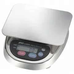 Food scale with a 5 in square weighing surface and 2 1/2 in overall height. Provides readability of 0.002 lb/1 g for precise ingredient measurement. IP65 rating permits washdown cleaning in wet environments. Suitable for commercial kitchens, bakeries, and food processing applications.