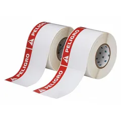 Precut label roll with PELIGRO header, 4 in x 6 in, made of white polyester with rubber adhesive. Contains 500 labels per roll, halogen-free material. Compatible with Brady IP Series printers. Used for industrial safety labeling to mark hazards.