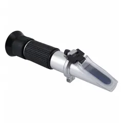 Analog handheld refractometer with +/-0.2% accuracy and manual temperature compensation. Measures battery fluid, propylene glycol, and ethylene glycol concentrations. Resolution: 0.01 for battery fluid, +/-10°F and +/-5°C for propylene glycol, +/-°F and +/-5°C for ethylene glycol. Dimensions: 6 1/4 in depth, 5 7/8 in width.