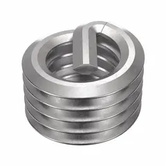 Free-running tanged helical insert for #10-32 threads, plain finish. Used to repair or reinforce tapped threads in metal, restoring strength to damaged holes or providing stronger threads in softer materials. Suitable for applications requiring reliable thread engagement in automotive, aerospace, and industrial machinery.