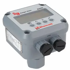 This flow monitor display is designed for mounting directly on turbine flowmeters. It features an aluminum housing and an LCD screen for local indication of flow rate and totalization. Suitable for industrial process monitoring and fluid handling applications.