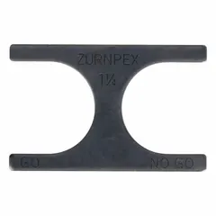 The ZURN QGA6 is a 1 1/4 inch copper PEX crimp gauge used to verify proper crimp connections on PEX tubing. It checks that crimp rings are compressed to the correct diameter, helping prevent leaks in plumbing systems. This tool is suitable for field verification by installers and maintenance technicians.