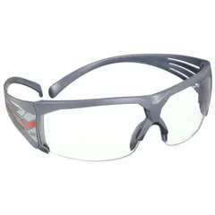 Half-frame safety glasses with clear lens and gray frame. Features Scotchgard™ Advanced Anti-Fog technology for reduced fogging. Padded comfort-fit design suitable for eye protection in industrial environments such as machining, material handling, and maintenance.