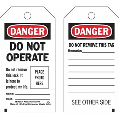 This lockout tag is made of polyester for resistance to moisture and chemicals in industrial environments. It features a write-on surface for adding specific remarks and is printed in English with a Danger Do Not Operate message. Used in lockout/tagout procedures to clearly communicate that equipment is undergoing maintenance and must not be operated.