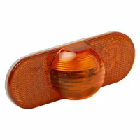 Incandescent turn signal light with amber oval lens, 2 1/4 in overall height. Features grommet mount for permanent installation and male pin electrical connection. Complies with FMVSS 108 standards. Used on commercial vehicles and trailers for side-marker indication of turns or lane changes
