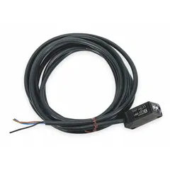 Rectangular photoelectric sensor from the OMRON E3Z series with a PBT body and prewired cable terminated with bare wires. Operates on 12-24V DC supply with PNP output. Suitable for object detection tasks such as presence sensing, positioning, and counting in industrial automation environments.