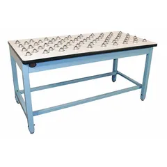 Fixed-height ball transfer workbench with a blue laminate top measuring 60 inches by 30 inches. Supports an overall load capacity of 1,000 pounds. Suitable for assembly, inspection, and light industrial tasks in material handling and storage workspaces.