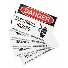 Polyester danger sign with adhesive mounting for quick application to equipment, panels, or walls. Nominal size 3 1/2 in x 5 in, 0.01 in thick. Not retroreflective or glow-in-the-dark. Sold in packs of 5.
