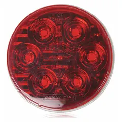 LED stop light with red round lens, 4 5/16 in overall diameter, PL-3 connector, grommet mount, and permanent installation. Complies with SAE J1398. Used on trucks, trailers, and heavy equipment for brake, turn, and tail lighting.