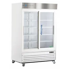 Upright pharmacy refrigerator with sliding glass door, white finish, and temperature alarm. Maintains 2°C to 7°C range for vaccine and medication storage. Uses R-290 refrigerant. Overall depth 33 1/4 in.
