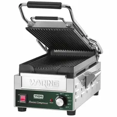 Single-press sandwich press with a cast-iron panini plate measuring 7 3/4 inches wide. Operates on 120V AC. Suitable for grilling panini, sandwiches, and flatbreads in commercial foodservice settings.