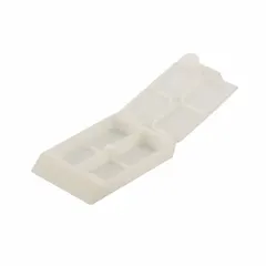 White embedding cassette made of polyoxymethylene with an overall length of 1.65 inches. Used in histology and pathology laboratories for embedding tissue samples in paraffin wax. The material resists chemicals during processing.