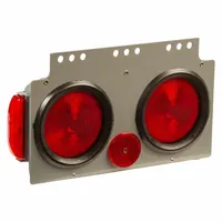 Red rectangular incandescent stop light with screw mount for permanent installation. Overall height 7 3/4 in. Electrical connection via male/female bullets. Complies with FMVSS 108. Used on trucks, trailers, and heavy equipment for brake and turn signaling