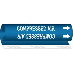 Wrap-around pipe marker for identifying compressed air lines. Blue background with white legend and directional arrows. Fits pipe outer diameters from 2-1/2 to 7-7/8 inches. Single marker supplied.