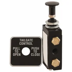 Manual air valve for controlling tailgate operation on heavy dump trucks. Constructed from steel with a black powder-coated finish. Rated to 120 psi. Suitable for pneumatic actuation in construction and mining applications.