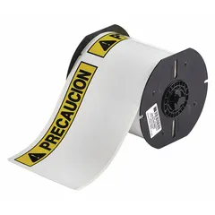 White vinyl label roll with PRECAUCION header, measuring 4 in x 6 1/4 in with 4 in width. Features acrylic adhesive and is compatible with i5300 printer series. Used for marking equipment or areas requiring caution in industrial environments.