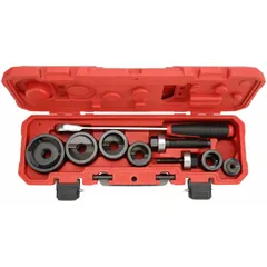 This 15-piece knockout punch set includes a splitter-type punch designed for creating holes in mild steel sheet metal up to 10 gauge. The set is supplied in a carrying case for storage and transport, suitable for job-site use in electrical and metal fabrication applications.