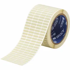 Precut label roll with 13/64 in x 21/32 in labels on a 2 61/64 in x 13/64 in carrier. Made of polyimide with permanent adhesive, compatible with i5100 printer series. Used for industrial identification, asset tags, wire markers, and component labels in environments requiring high temperature resistance.