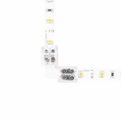 Tape-to-tape connector with screw terminals for creating 90° right-angle turns in linear tape light installations. Supports wire gauges from 20 AWG to 16 AWG. Used for corner routing in under-cabinet, cove, or display lighting.