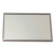 This tamper-resistant bathroom mirror features a polished stainless steel frame with a silver finish and polished edge. The glass mirror measures 30 inches wide by 36 inches high with a 1-inch depth. It is designed for use in commercial and institutional restrooms where safety and durability are required.