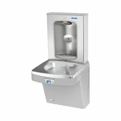 This OASIS on-wall unit combines a single drinking fountain with a bottle filler, housed in a stainless steel cabinet with a Graystone finish. It features a touchless sensor for hands-free operation and a chilling capacity of 8 gallons per hour at 50°F. Top panel access simplifies filter maintenance. Suitable for commercial and public spaces requiring both drinking and bottle-filling stations.
