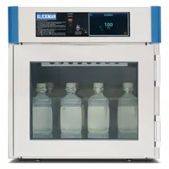 This benchtop warming cabinet features a touch screen interface and a glass door for visual monitoring. It maintains temperatures suitable for preheating medical instruments, blankets, or laboratory samples. Overall dimensions: 24 in width, 20 5/8 in depth. Door material: glass.