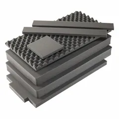 Plastic foam insert with cubed pick-and-pull design, allowing custom compartments by removing pre-scored cubes. Measures 33 1/8 x 18 7/8 inches with foam thicknesses of 2, 3, 1 1/2, and 3/4 inches. Compatible with PELICAN 1615 case. Used to protect and organize equipment during transport in industrial and field applications.