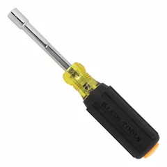 This pass-through nut driver features a hollow hex design that allows it to drive nuts on long threaded rods or studs. It is a standard-length tool without a magnetized tip, suitable for use in electrical, mechanical, and industrial applications where clearance is limited.