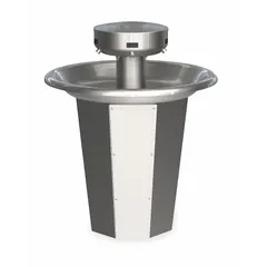 This sensor-operated wash fountain from the Sentry series features a circular stainless steel bowl with a central rising drain. It is ADA compliant and has a 36-inch overall width. Designed for high-traffic commercial restrooms, schools, and healthcare facilities, it allows multiple users to wash simultaneously without touching surfaces, promoting hygiene and water conservation.