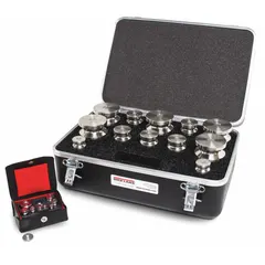 This metric calibration weight kit includes five stainless steel cylinder weights with a 2 kg nominal mass, supplied in a protective case. Used to verify and calibrate industrial scales and balances in laboratories, manufacturing, and quality control applications.