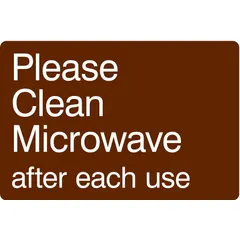 This adhesive-mounted sign displays a 'Please Clean Microwave After Each Use' message to encourage cleanliness in break rooms, kitchens, or office pantries. Made of acrylic, the sign measures 6 inches by 9 inches and is not retroreflective, not glow-in-the-dark, and has no anti-slip surface.
