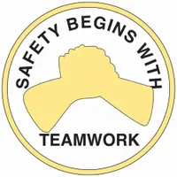 Non-reflective hard hat label with 'Safety Begins With Teamwork' message. 2-inch diameter, English text, universal design. Sold as a 4-pack. Suitable for use on hard hats in industrial environments to promote safety awareness