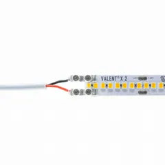 Tape-to-wire/terminal block connector for low-voltage linear lighting systems. Accepts wire gauges from 20 AWG to 16 AWG. Used to join LED tape strips to wire or terminal blocks for secure, solderless connections.