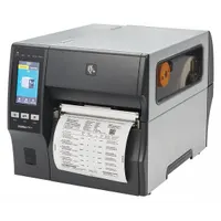 Wired industrial label printer with 12 in/sec print speed, 6.6 in max print width, and Rewind/Peel Off dispensing. Features a color touch screen and RS232 connectivity. Suitable for high-volume label printing in manufacturing, warehousing, and logistics environments