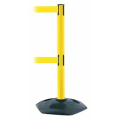 This TENSABARRIER barrier post features a yellow plastic post and a yellow retractable belt with no legend. The belt extends to 7 1/2 ft and retracts into the post. The rubber base provides stability on floors. Used for crowd control, queue management, and safety delineation in industrial and public spaces.