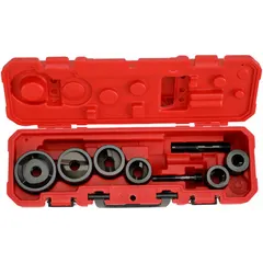 This knockout punch and die set creates 2 in nominal circular holes in mild steel sheet metal up to 10 ga thickness. The splitter-type design includes a 7/16 in draw stud. Typical applications include electrical panel fabrication, junction box installation, and metal enclosure work where precise holes are required for conduit or cable entry.
