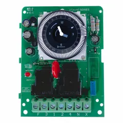 Electromechanical defrost timer switch without enclosure. SPST-NC contact type. Operates on 120-240V AC with a maximum cycle time of 24 hours. Used in commercial refrigeration systems to automatically control defrost cycles in walk-in coolers, freezers, and display cases.