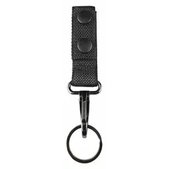 Black nylon ballistic key pouch with snap closure. Measures 6 1/4 inches by 29 mm. Designed for secure key storage and quick access, suitable for carrying on a belt or in a tool bag.
