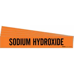 Adhesive pipe marker with orange background and black legend reading 'Sodium Hydroxide'. Designed for pipes with outer diameter of 8 inches and larger. Each pack contains 5 markers without directional arrows. Used to label piping systems in industrial facilities for identification of caustic lines.