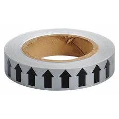 This gray vinyl banding tape with black directional flow arrows is used for pipe marking in industrial facilities. The tape is non-reflective and supplied in a 1-inch width by 90-foot roll. It is applied to pipes to indicate flow direction and aid in identification per standard pipe marking practices.